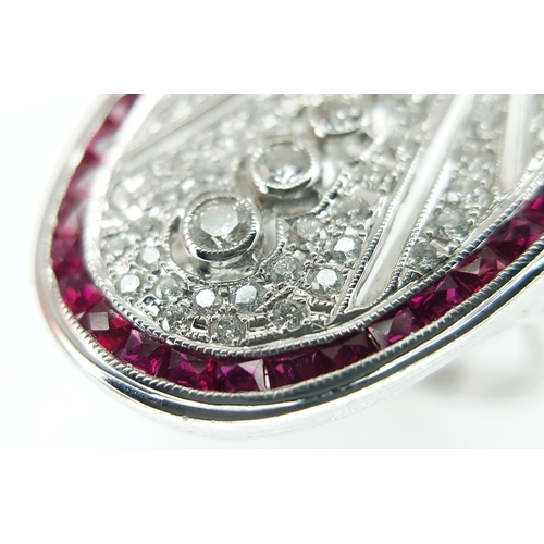 122 - A Head-Turning 18K White Gold Mult-Gemstone Cocktail Ring in Oval Shield Form. A 0.47ct sapphire sit... 