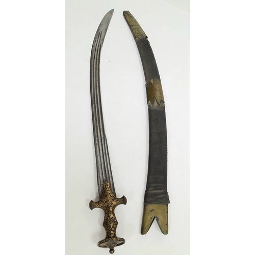 220 - An Antique (circa 1800) Indian Tulwar Curved Sword - Typical of the Mughal Period. A curved single e... 