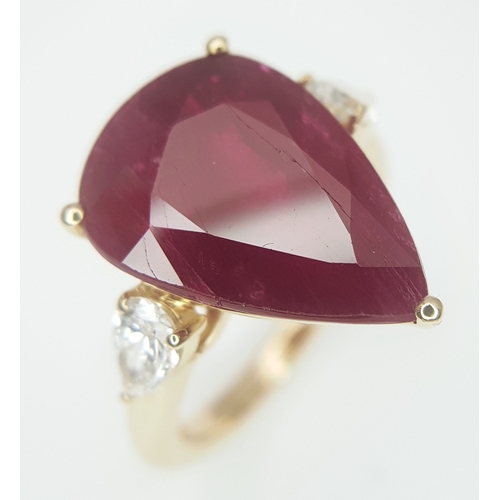 A Stunning GIA Triple Certified 18K Yellow Gold Ruby and Diamond Cocktail Ring. An 8.77ct natural pear-cut Mozambique ruby flanked by two pear-cut diamonds - 0.63ctw having D colour and VVS1 clarity. Size N 1/2. 7.3g total weight. Ref: LXR-90014.
