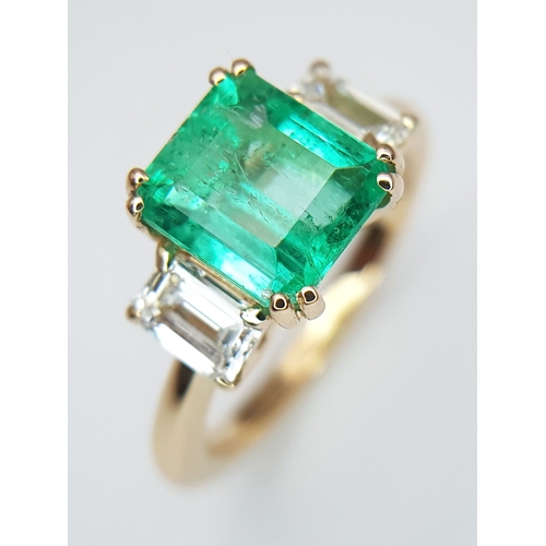 An GIA Triple Certified 18K Yellow Gold, Colombian Emerald and Diamond Cocktail Ring. A 2.93ct natural octagonal cut emerald flanked by two emerald cut diamonds - 0.82ctw having E colour with Flawless and Internally Flawless clarity. Size N 1/2. 5.82g total weight. Ref: LXR-90004.