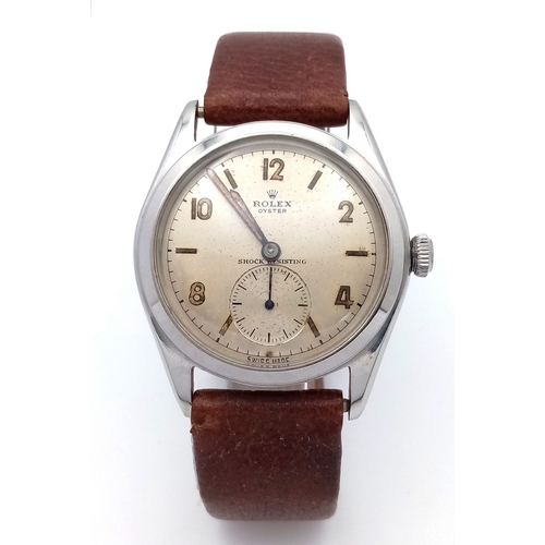 178 - A Vintage Rolex Oyster Mechanical Gents Watch. Model 4499. Brown leather strap. Stainless steel case... 
