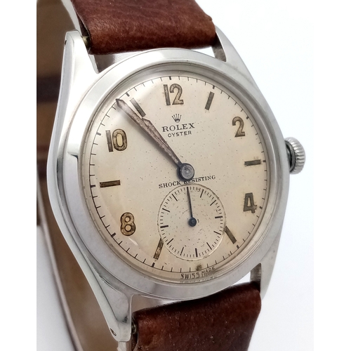 178 - A Vintage Rolex Oyster Mechanical Gents Watch. Model 4499. Brown leather strap. Stainless steel case... 