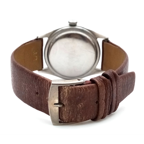 178 - A Vintage Rolex Oyster Mechanical Gents Watch. Model 4499. Brown leather strap. Stainless steel case... 