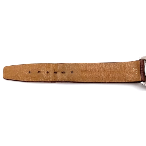 178 - A Vintage Rolex Oyster Mechanical Gents Watch. Model 4499. Brown leather strap. Stainless steel case... 