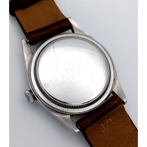 178 - A Vintage Rolex Oyster Mechanical Gents Watch. Model 4499. Brown leather strap. Stainless steel case... 