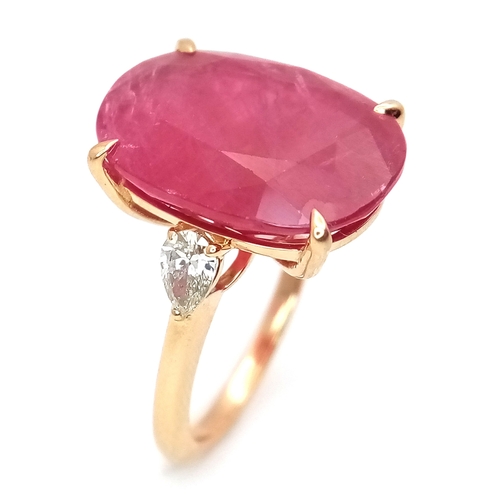 25 - An IGI Certified 18K Yellow Gold (tests as) Ruby and Diamond Cocktail Ring. A 14.29ct natural cushio... 