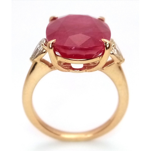 25 - An IGI Certified 18K Yellow Gold (tests as) Ruby and Diamond Cocktail Ring. A 14.29ct natural cushio... 