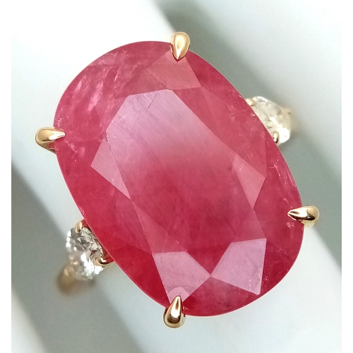 25 - An IGI Certified 18K Yellow Gold (tests as) Ruby and Diamond Cocktail Ring. A 14.29ct natural cushio... 