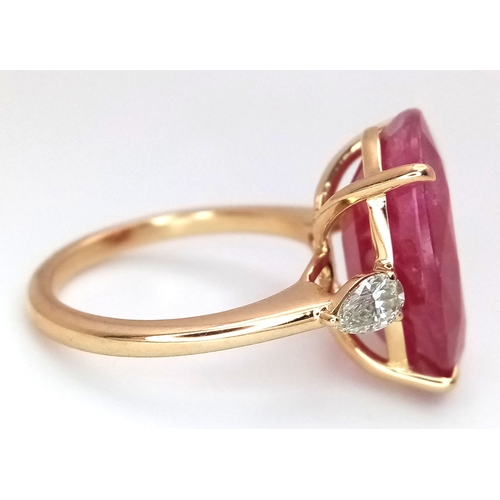 25 - An IGI Certified 18K Yellow Gold (tests as) Ruby and Diamond Cocktail Ring. A 14.29ct natural cushio... 