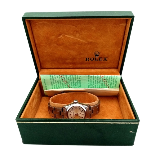 39 - A Ladies 1970’s Stainless Steel Oyster Perpetual Rolex Watch - fitted with Sun-burst Dial. Case -26m... 