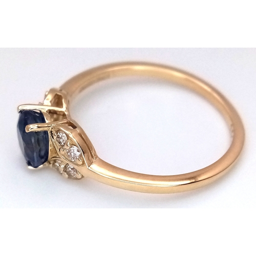 60 - A 14K Yellow Gold Natural Sapphire and Diamond Cocktail Ring. A 1.11ct oval cut sapphire with diamon... 