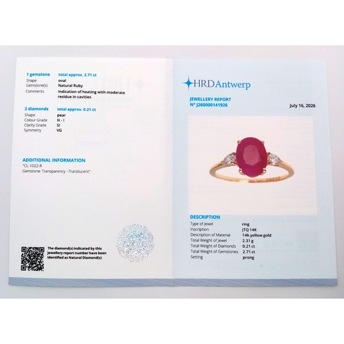 67 - A 14K Yellow Gold Natural Ruby and Diamond Cocktail Ring. A 2.71ct oval cut ruby with diamond accent... 
