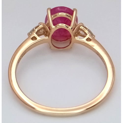 67 - A 14K Yellow Gold Natural Ruby and Diamond Cocktail Ring. A 2.71ct oval cut ruby with diamond accent... 