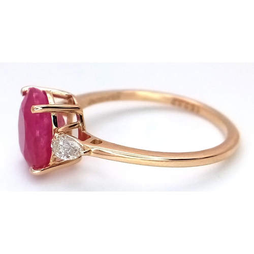 67 - A 14K Yellow Gold Natural Ruby and Diamond Cocktail Ring. A 2.71ct oval cut ruby with diamond accent... 