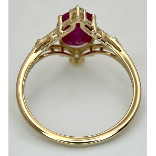 88 - A 14K Yellow Gold Natural Ruby and Diamond Cocktail Ring. A 2.19ct oval cut ruby with compass point ... 