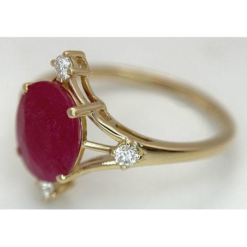 88 - A 14K Yellow Gold Natural Ruby and Diamond Cocktail Ring. A 2.19ct oval cut ruby with compass point ... 