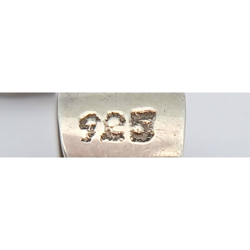 57 - A 925 silver necklace with a dual-disc pendant. Total weight 21g. Approx 84cm length with a 7cm pend... 