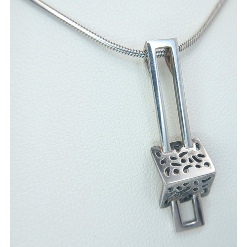 50 - A Stylish 925 Sterling Silver Geometric Drop Pendant Necklace - 44cm Length. Features an openwork ge... 