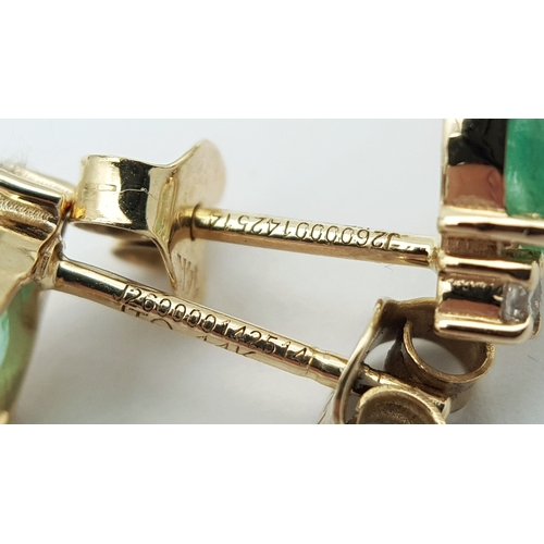 53 - A Pair of 14K Yellow Gold Natural Emerald and Diamond Drop Earrings. Ten oval natural emeralds total... 