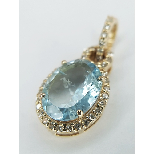 95 - A 14K Yellow Gold Natural Aquamarine and Diamond Pendant. A 1.15ct oval mixed cut natural aquamarine... 