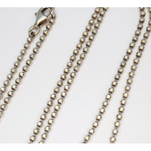 11 - A Beautiful 925 Sterling Silver Garnet Pendant Necklace - 46cm length. The pendant is set with a rou... 