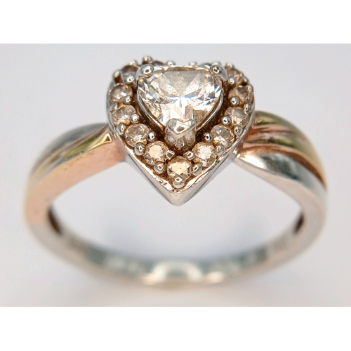 31 - A Sparkling 925 Sterling Silver CZ Set Heart Ring - Size O 1/2. The ring is set with a central heart... 