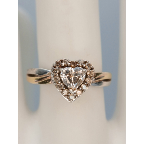 31 - A Sparkling 925 Sterling Silver CZ Set Heart Ring - Size O 1/2. The ring is set with a central heart... 