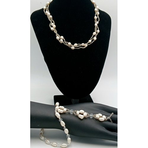 53 - An Attractive Freshwater Pearl Necklace and Bracelet Set. The set is set with irregular freshwater p... 