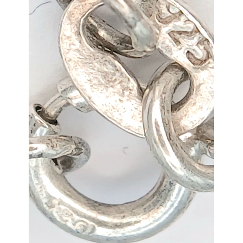 8 - A 925 Sterling Silver Heart Link Bracelet - 18cm length. Formed with a series of linked heart-shaped... 