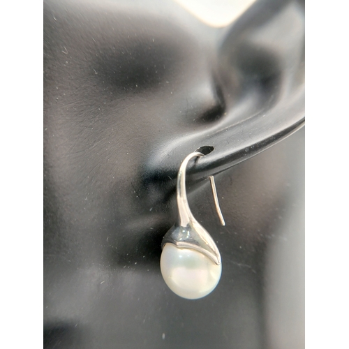 14 - A Collection of 925 Sterling Silver Pearl Jewellery. Including a pearl dress ring, hallmarked 925 In... 