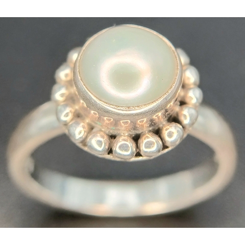 14 - A Collection of 925 Sterling Silver Pearl Jewellery. Including a pearl dress ring, hallmarked 925 In... 