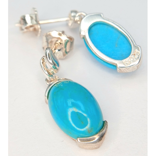 43 - A Pretty Pair of 925 Sterling Silver Turquoise Set Drop Earrings - 2.2cm drop. Each earring is set w... 