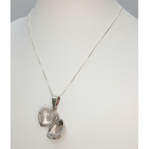 49 - A 925 Sterling Silver Heart Locket Pendant Necklace - 46cm length. The necklace is fitted with a pol... 