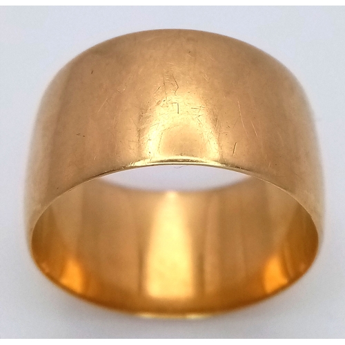 3 - An 18K Yellow Gold Band Ring. 11mm width. Size Q 1/2. 9.3g.