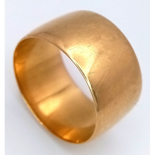 3 - An 18K Yellow Gold Band Ring. 11mm width. Size Q 1/2. 9.3g.