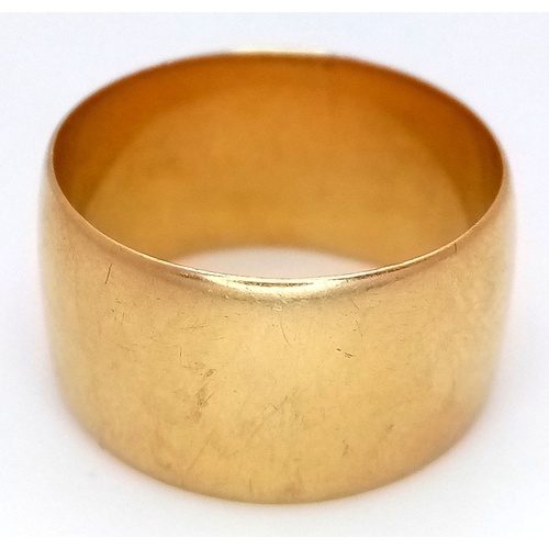 3 - An 18K Yellow Gold Band Ring. 11mm width. Size Q 1/2. 9.3g.