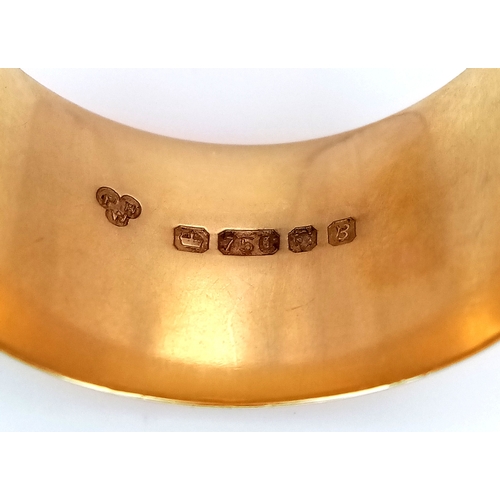 3 - An 18K Yellow Gold Band Ring. 11mm width. Size Q 1/2. 9.3g.