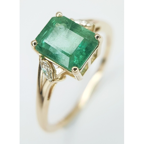 74 - A 14K Yellow Gold Natural Emerald and Diamond Ring. A 1.83ct octagon step cut natural emerald with m... 