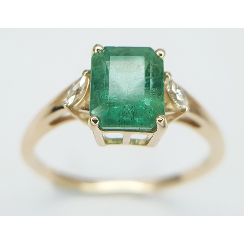 74 - A 14K Yellow Gold Natural Emerald and Diamond Ring. A 1.83ct octagon step cut natural emerald with m... 