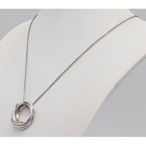 20 - A 925 Sterling Silver Circular Pendant Necklace. 46cm necklace. Pendant measures 2cm. 8g total weigh... 
