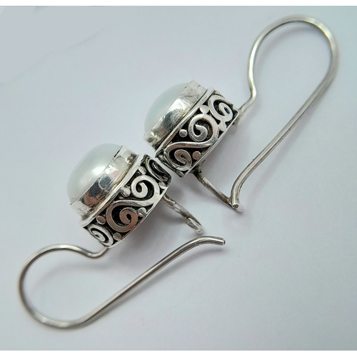 34 - Two vintage Pairs of 925 Sterling Silver Stone Set Drop Earrings. One pair is set with oval pink cab... 