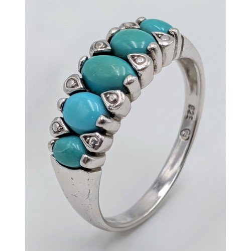 48 - A Pair of 925 Sterling Silver Turquoise Set Dress Rings. One ring is set with five oval turquoise ca... 
