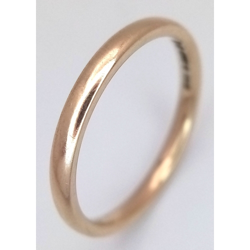 17 - A 9K Yellow Gold Band Ring. 3mm width. UK hallmarks. Size P. 2.15g.