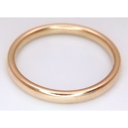 17 - A 9K Yellow Gold Band Ring. 3mm width. UK hallmarks. Size P. 2.15g.