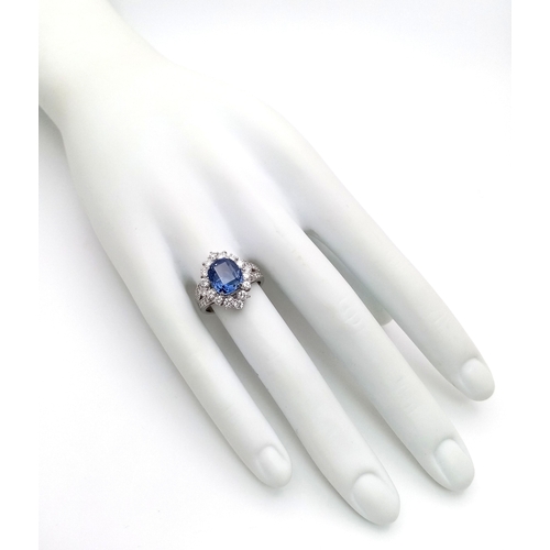 19 - A Breath-Taking, GIA Certified, 950 Platinum, Natural Sapphire and Diamond Dress Ring. Set with a 4.... 