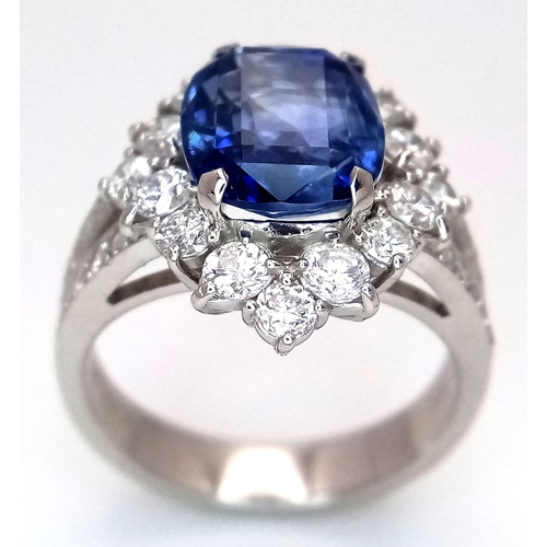 19 - A Breath-Taking, GIA Certified, 950 Platinum, Natural Sapphire and Diamond Dress Ring. Set with a 4.... 