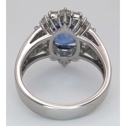 19 - A Breath-Taking, GIA Certified, 950 Platinum, Natural Sapphire and Diamond Dress Ring. Set with a 4.... 