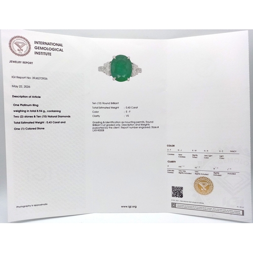 46 - A Stunning 950 Platinum Natural Emerald and Diamond Cocktail Ring. Set with an oval cut 5.69ct natur... 