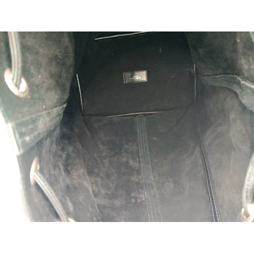 55 - A Black Yves Saint Laurent Heart Studded Tote Bag. Black leather exterior with silver-toned heart-sh... 
