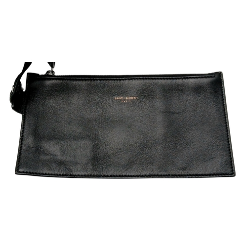 55 - A Black Yves Saint Laurent Heart Studded Tote Bag. Black leather exterior with silver-toned heart-sh... 